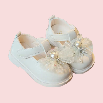 Preview: Süsse, weiche Mädchenschuhe in crème mit Tülldeko und Klettverschluss